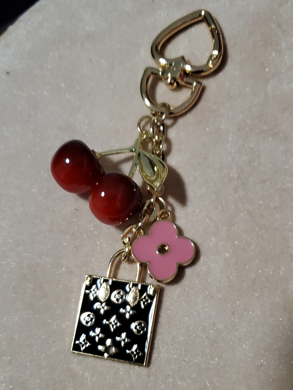 Source Unknown Gold-Tone Cherry, Pink Flower & Black Enamel Charm Keyring